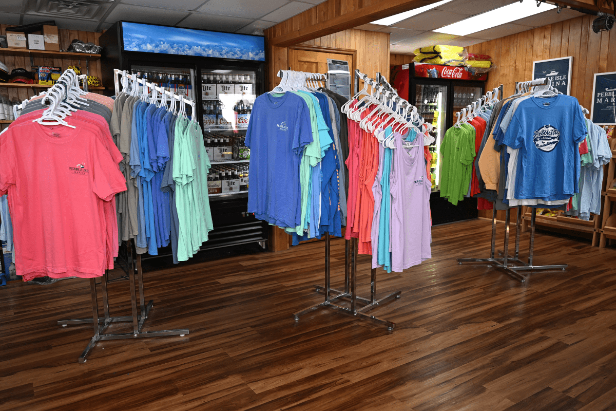 Kentucky Lake Boat Slip - Pebble Isle Ship Store - shirts on display